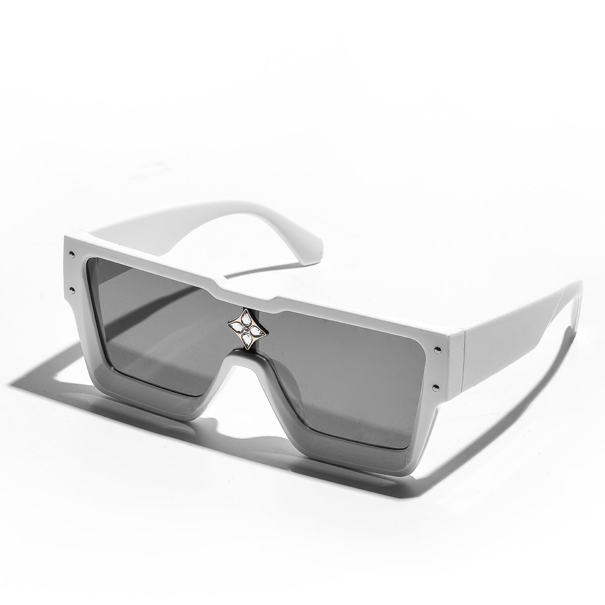 lack luxury sunglasses with gold accents on model