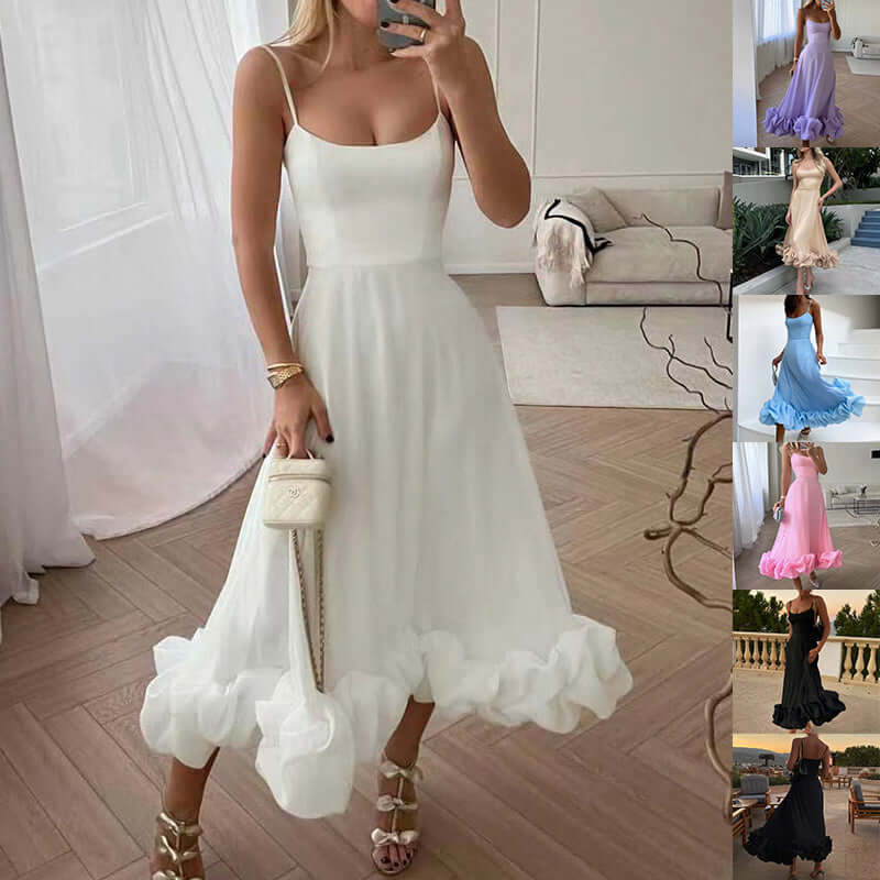 Model wearing a white A-line dress with ruffled hem, showcasing a stylish and elegant summer outfit.