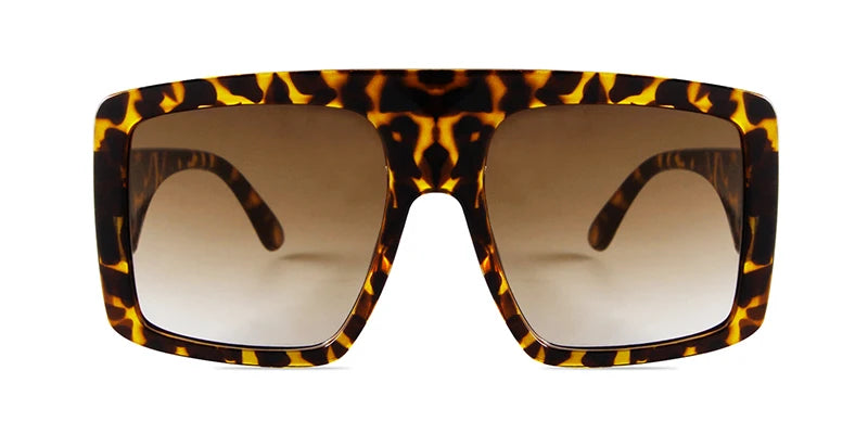 Sunglasses with a tortoiseshell frame and brown lenses.