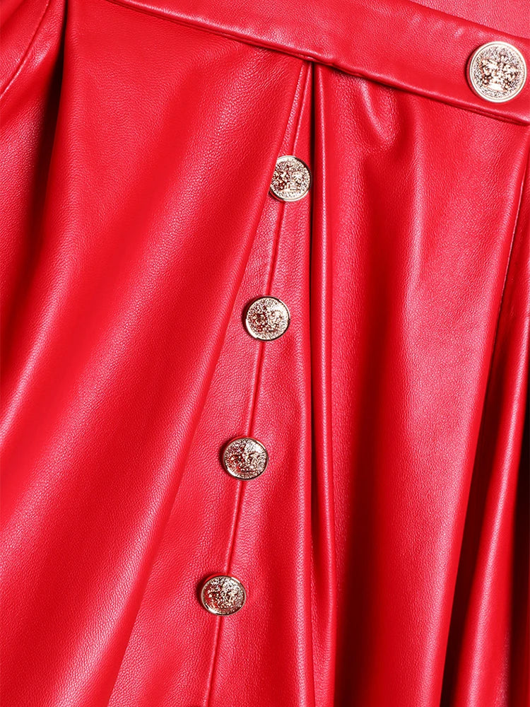 Close-up of a red leather jacket with gold buttons