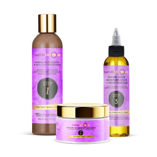 Three hair care products with purple labels on a white background