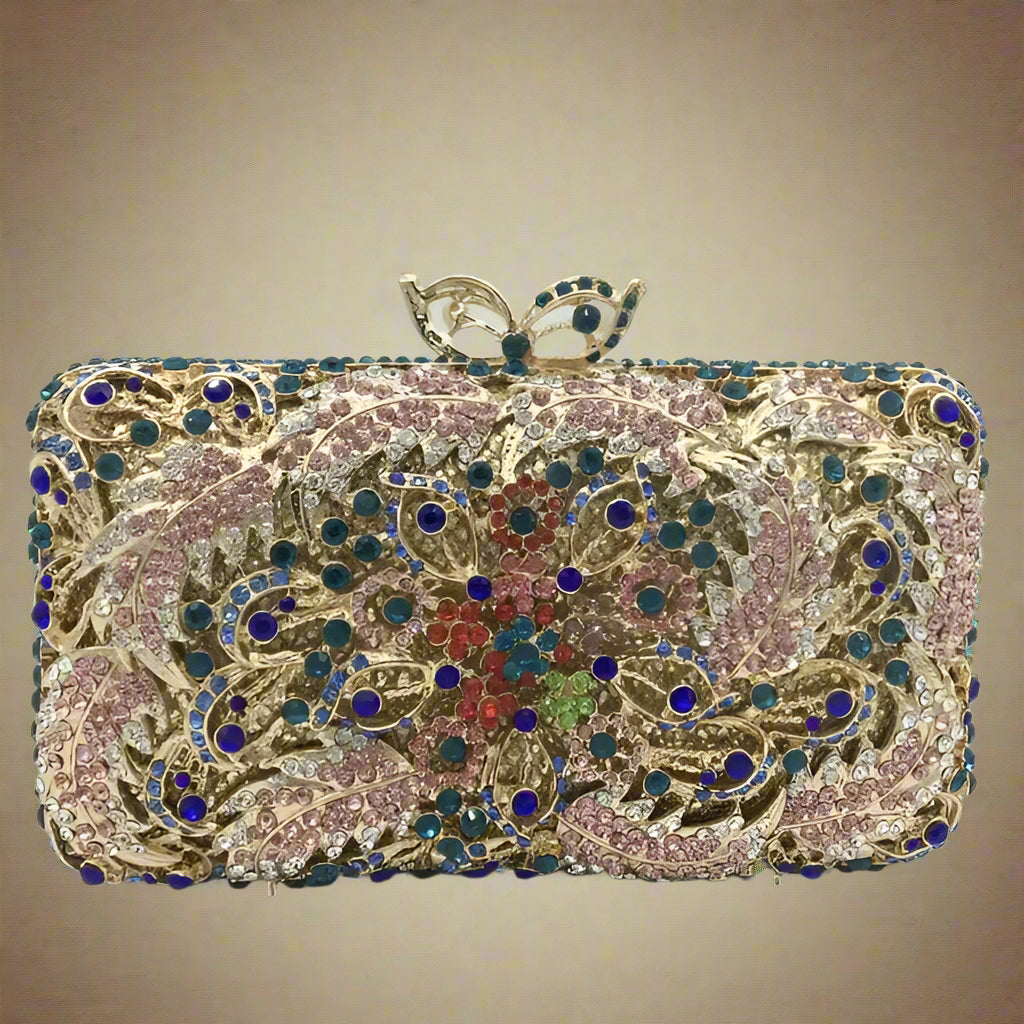 Decorative clutch bag with intricate patterns and colorful stones.