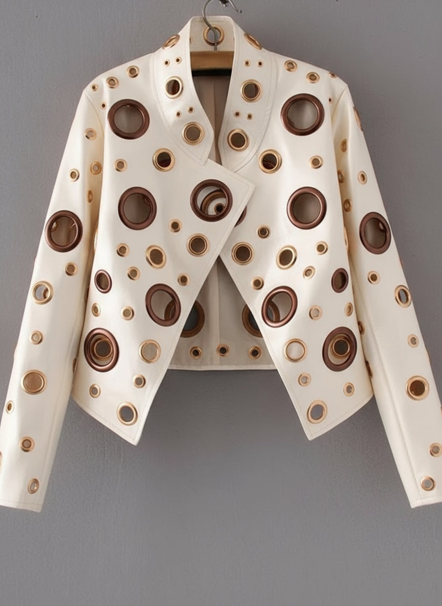 Gold jacket with circular cutouts 