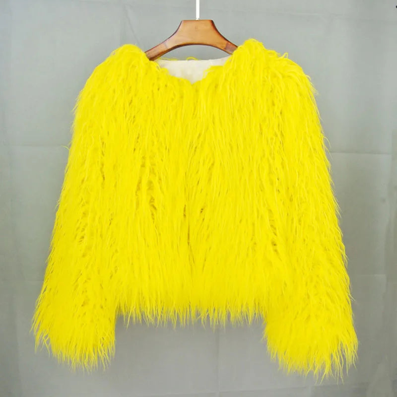Yellow fluffy sweater on a hanger 