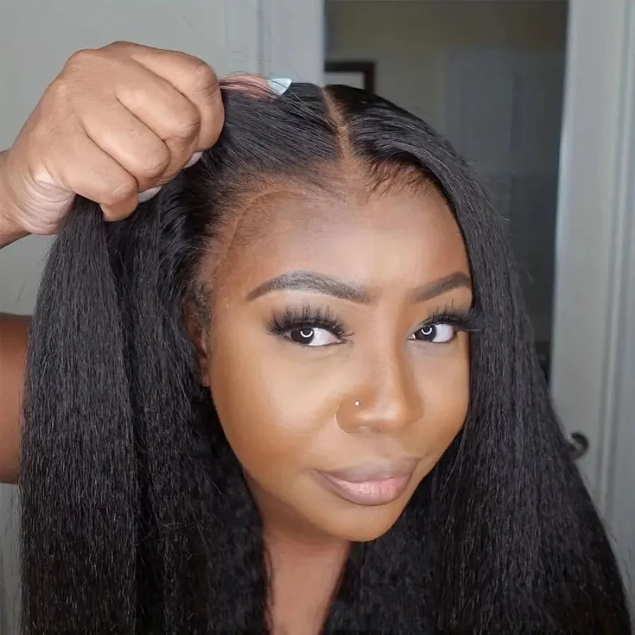Woman with a lace wig being styled in a close-up shot.
