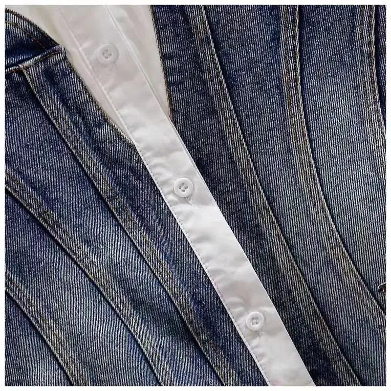 Close-up of a long sleeves single breasted blouse for women, featuring blue denim fabric and a white button-up front.