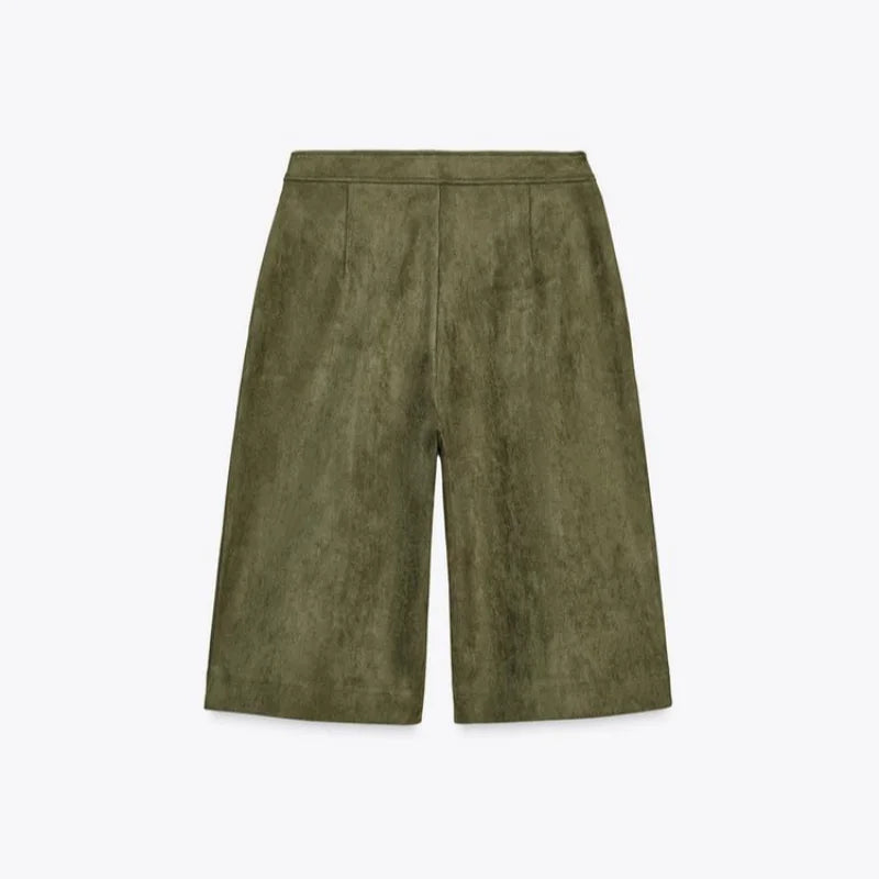 Green suede shorts.