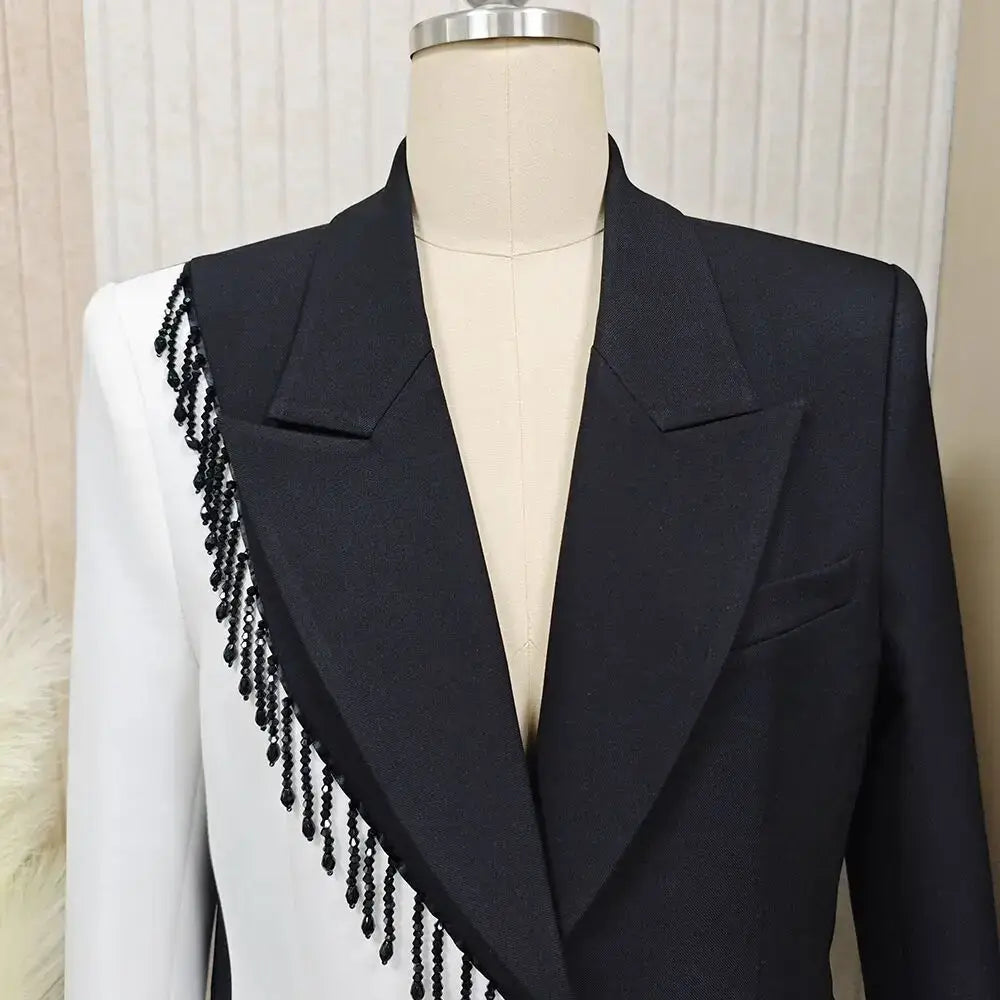 Colorblock patchwork tassel blazer for women, featuring black and white panels and bead embellishments.