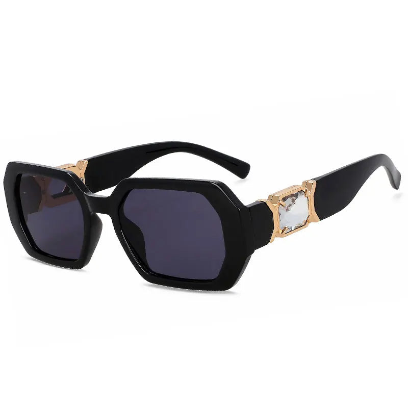 Black sunglasses with gold accents