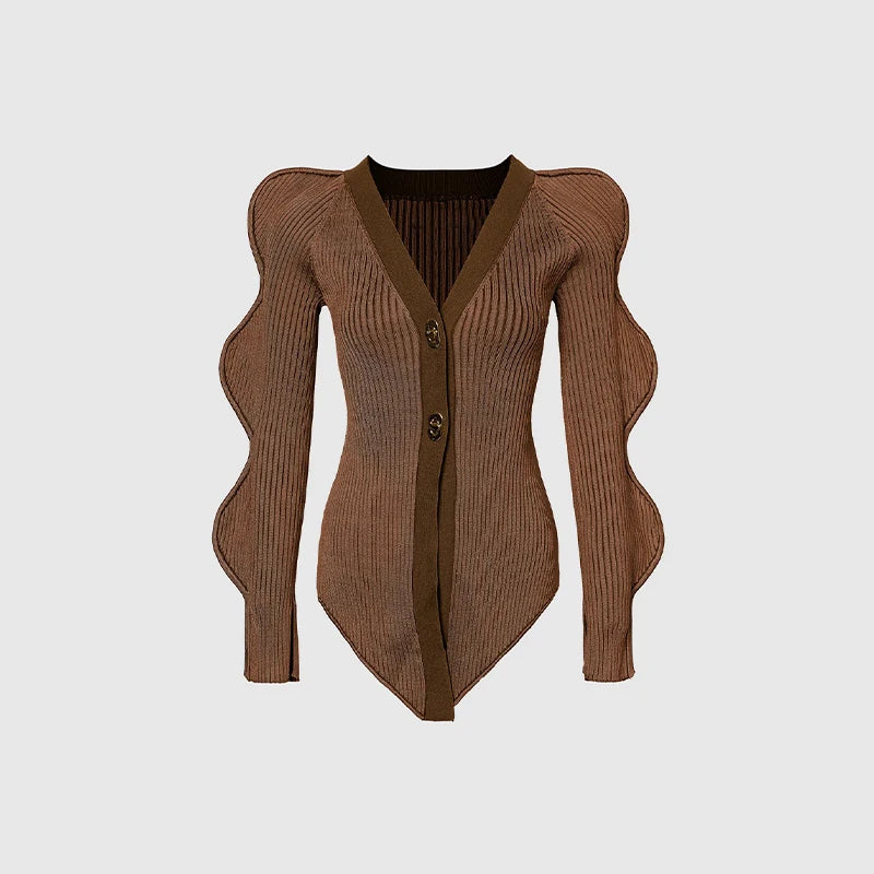 Brown ribbed sweater with unique sleeve.