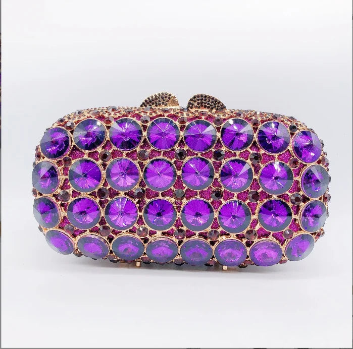 Purple gemstone clutch bag.