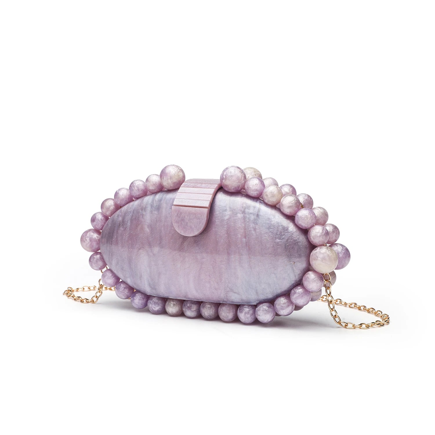 Pink clutch bag with pearl embellishments.