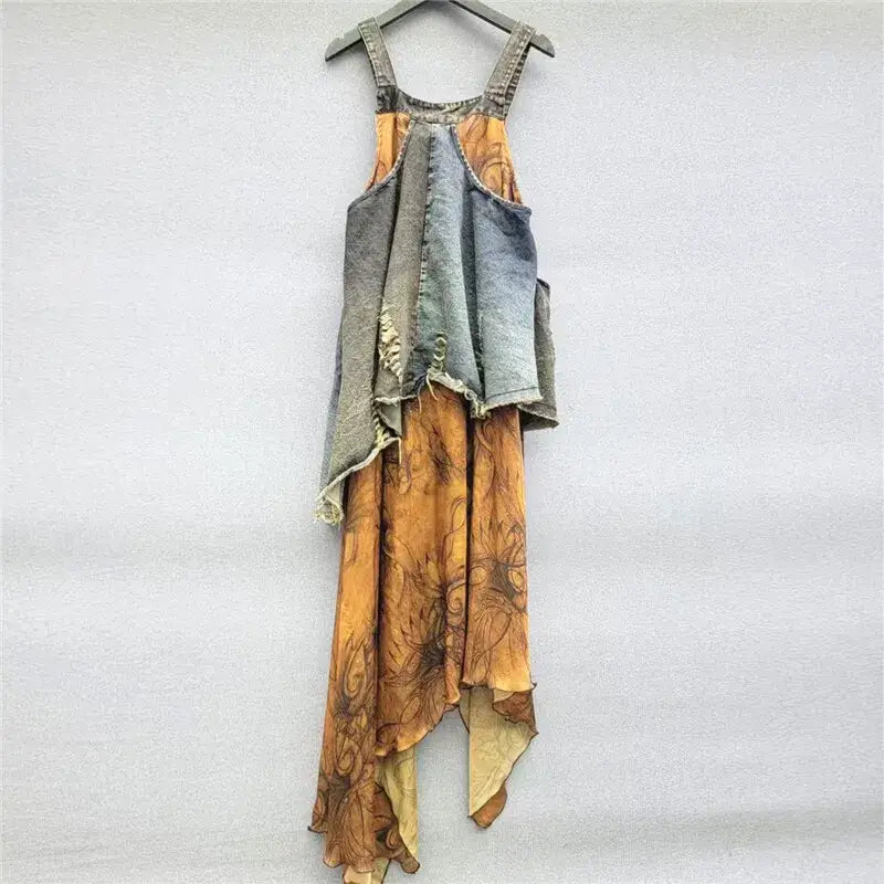 Vintage Women's Patchwork Denim Sling Dress with unique design and flowing hemline, perfect for fashion-forward styles.