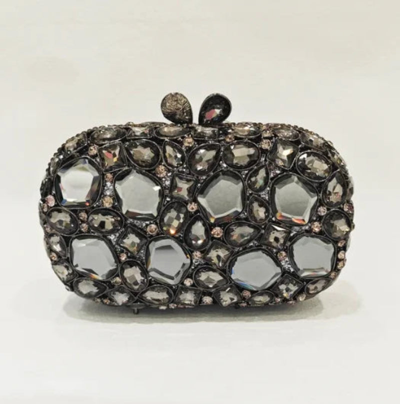 Elegant clutch bag with crystal embellishments.