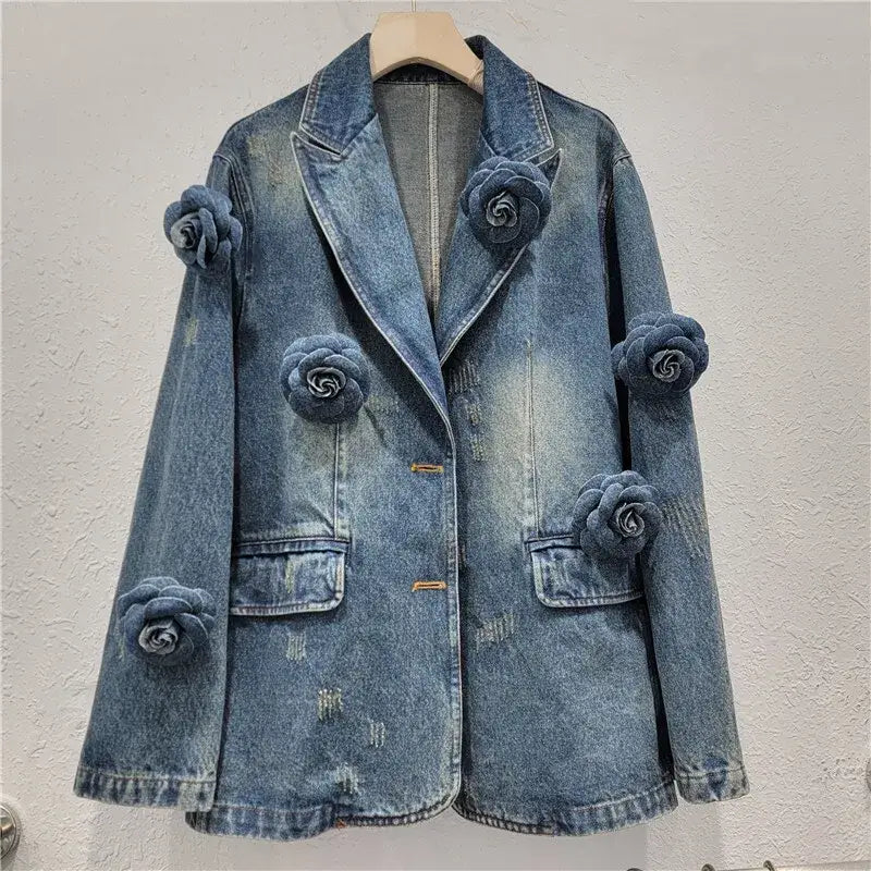 Women's relaxed denim blazer with 3D floral embroidery, perfect for stylish layering and comfort.