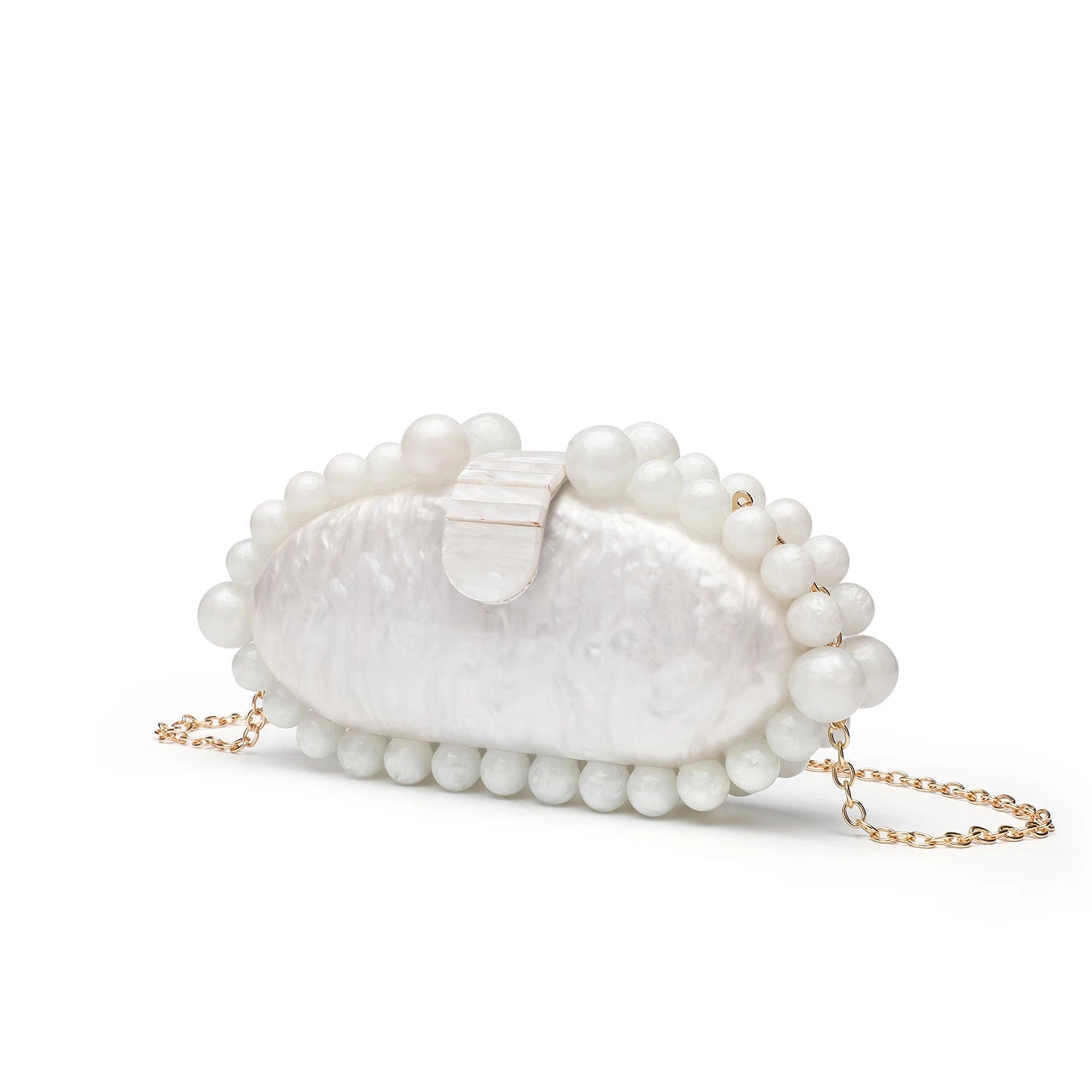 White clutch with pearl embellishments.