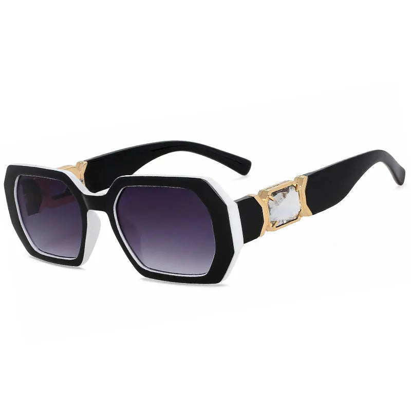 Black sunglasses with gold accents