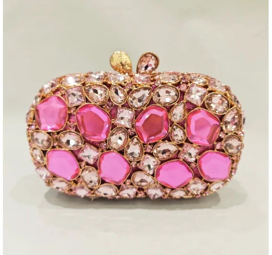 Elegant clutch bag with pink gemstones.