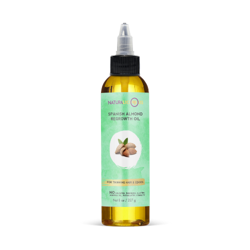 Bottle of Natura Oléo Spanish Almond Regrowth Oil on a white background