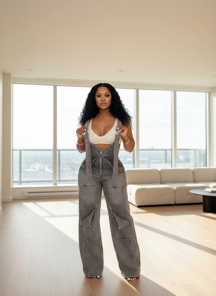 Woman wearing a gray denim overalls 