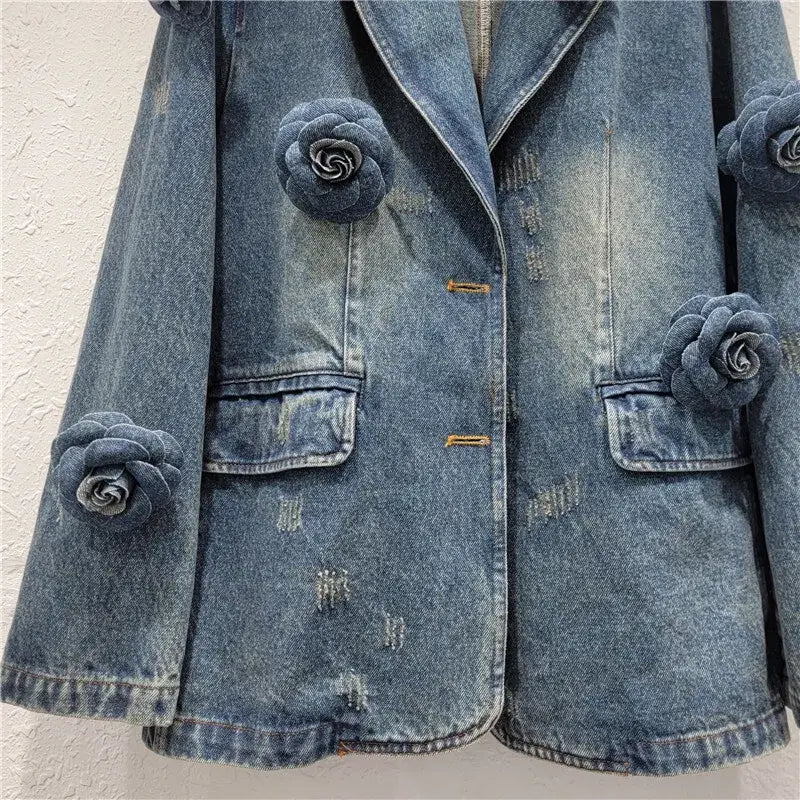 Close-up of a Women's 3D Floral Embroidered Relaxed Denim Blazer with denim roses.