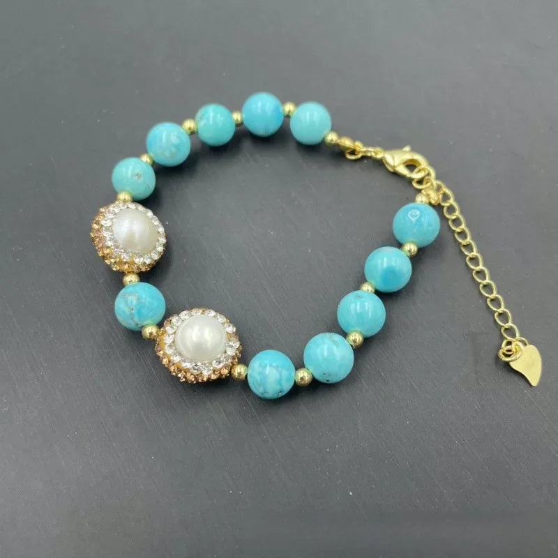 Turquoise beaded bracelet with gold accents.