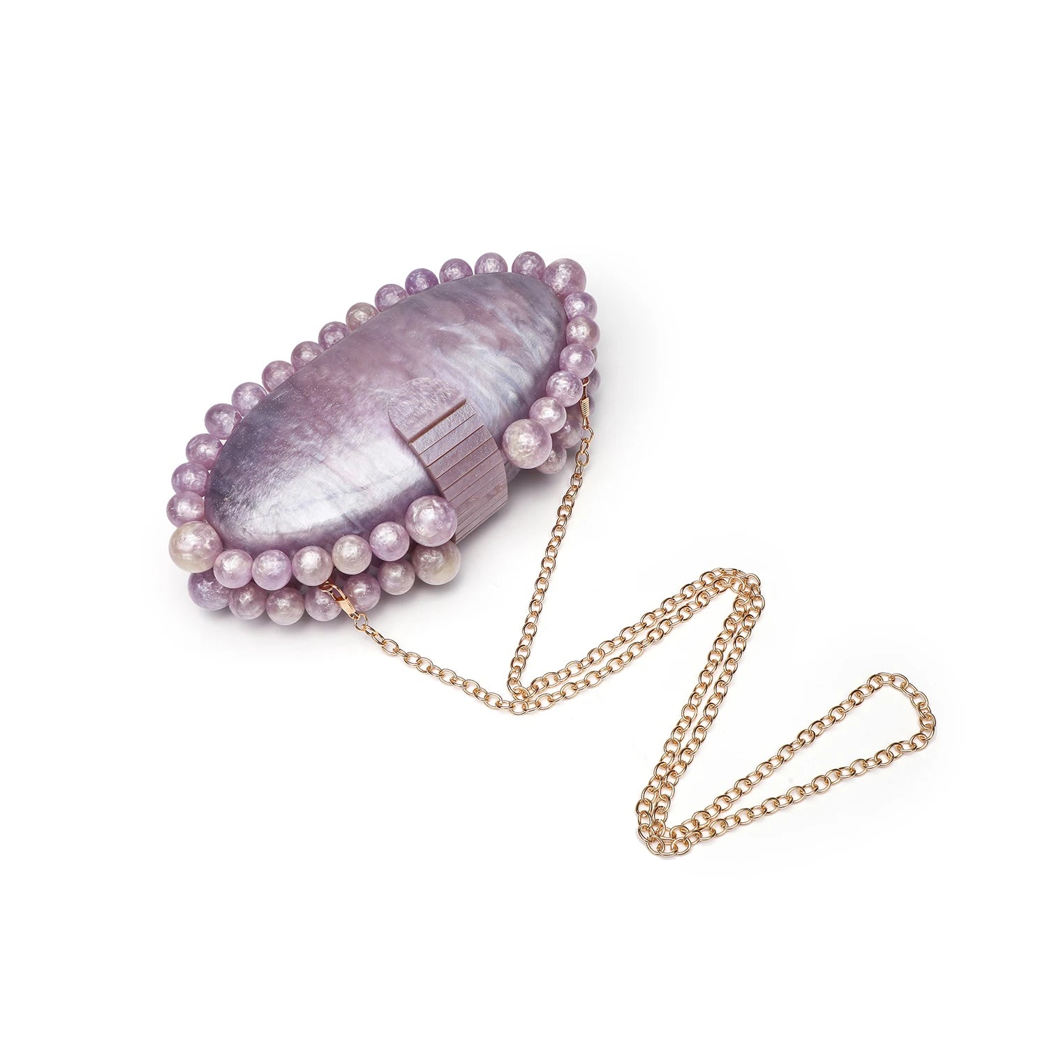 Purple shell handbag with pearl detailing and a gold chain.