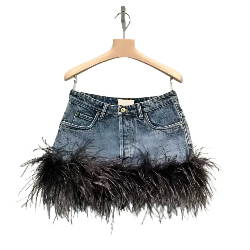 Trendy denim skirt with spliced feather edge, showcasing chic and modern high-waist design for stylish outfits.