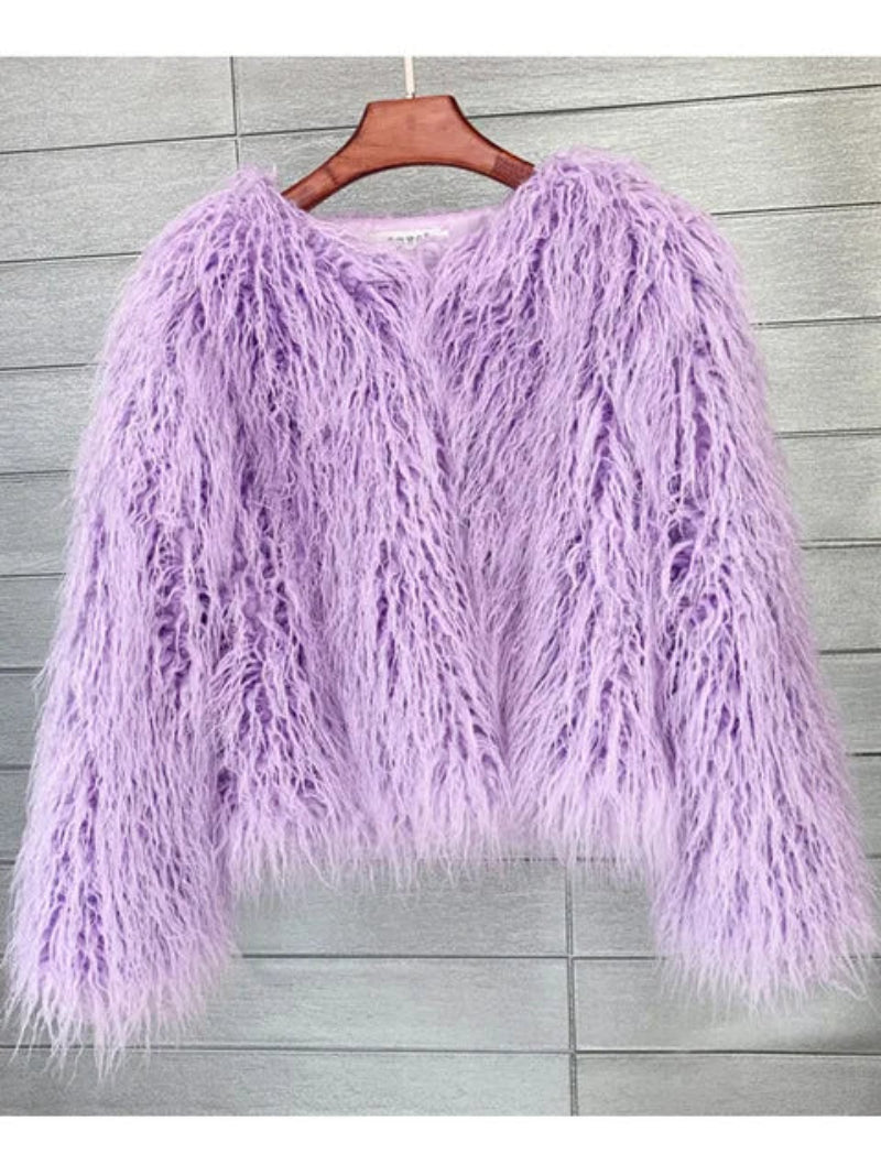 Purple fluffy jacket on a wooden hanger 