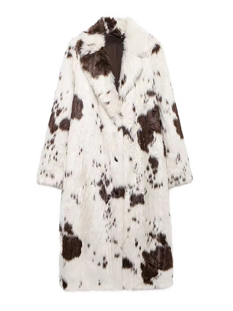 White coat with brown cow print pattern 