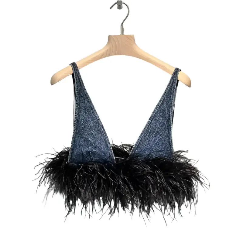 Trendy denim bra with spliced black feather edge, perfect for bold fashion statements and stylish outfits.