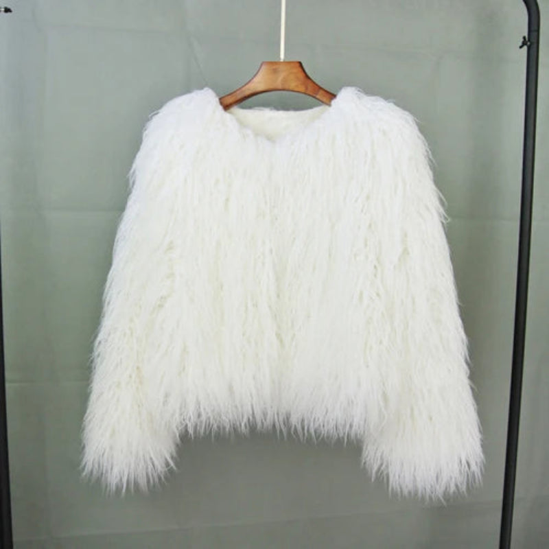 White fluffy jacket on a hanger against 