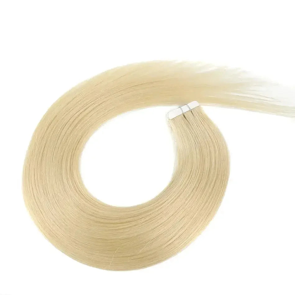 Tape-In extensions made from 100% human hair in a stunning blonde shade, offering a lightweight and seamless look.