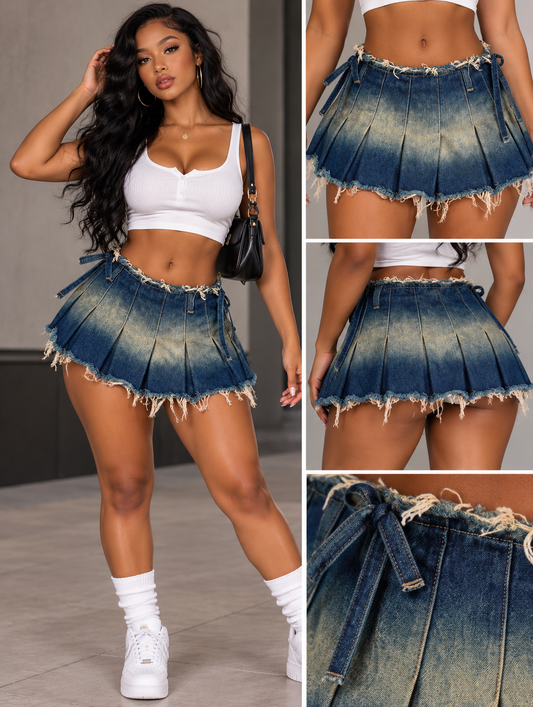 A woman modeling a pleated denim mini skirt with a faded blue wash and frayed hem, shown in a full-body pose and three close-up detail panels on the right. She wears a white crop top, white socks, and white sneakers, and carries a black shoulder bag.