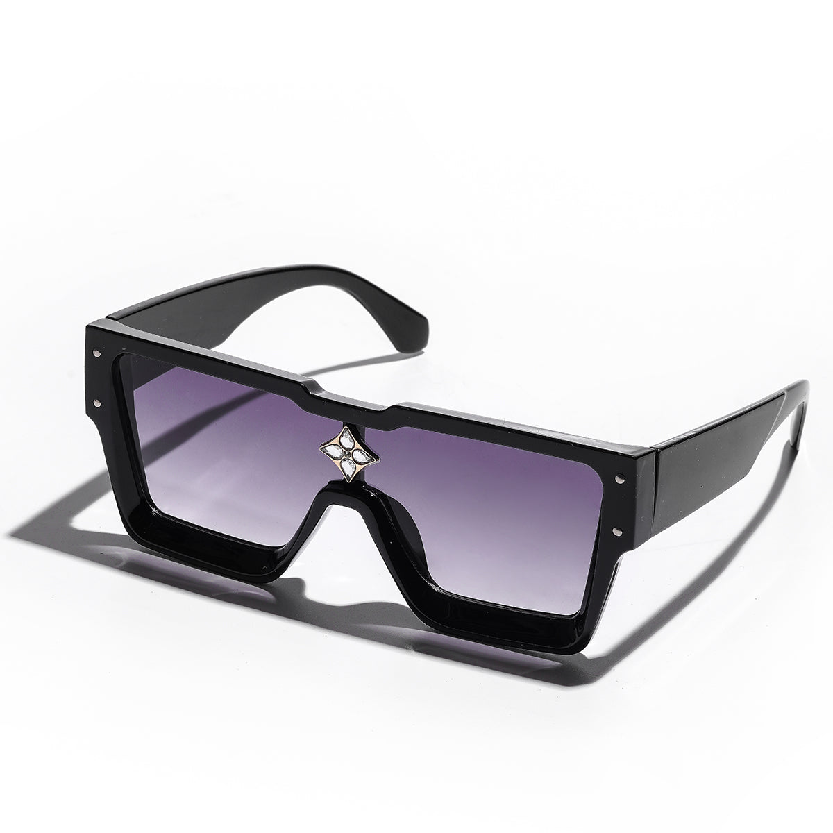 lack luxury sunglasses with gold accents on model